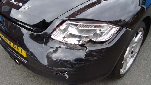 porsche with damaged rear