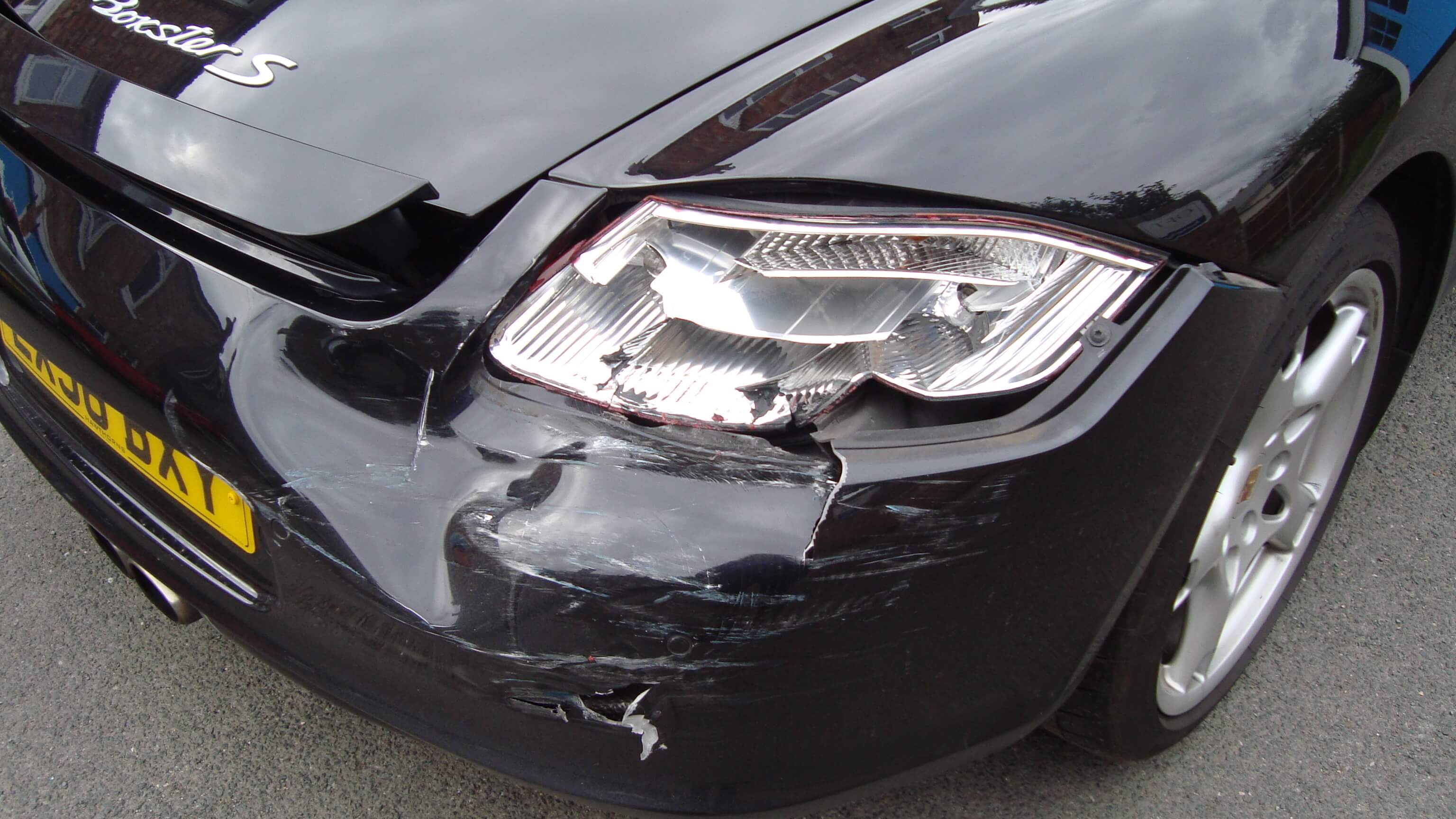 porsche with damaged rear