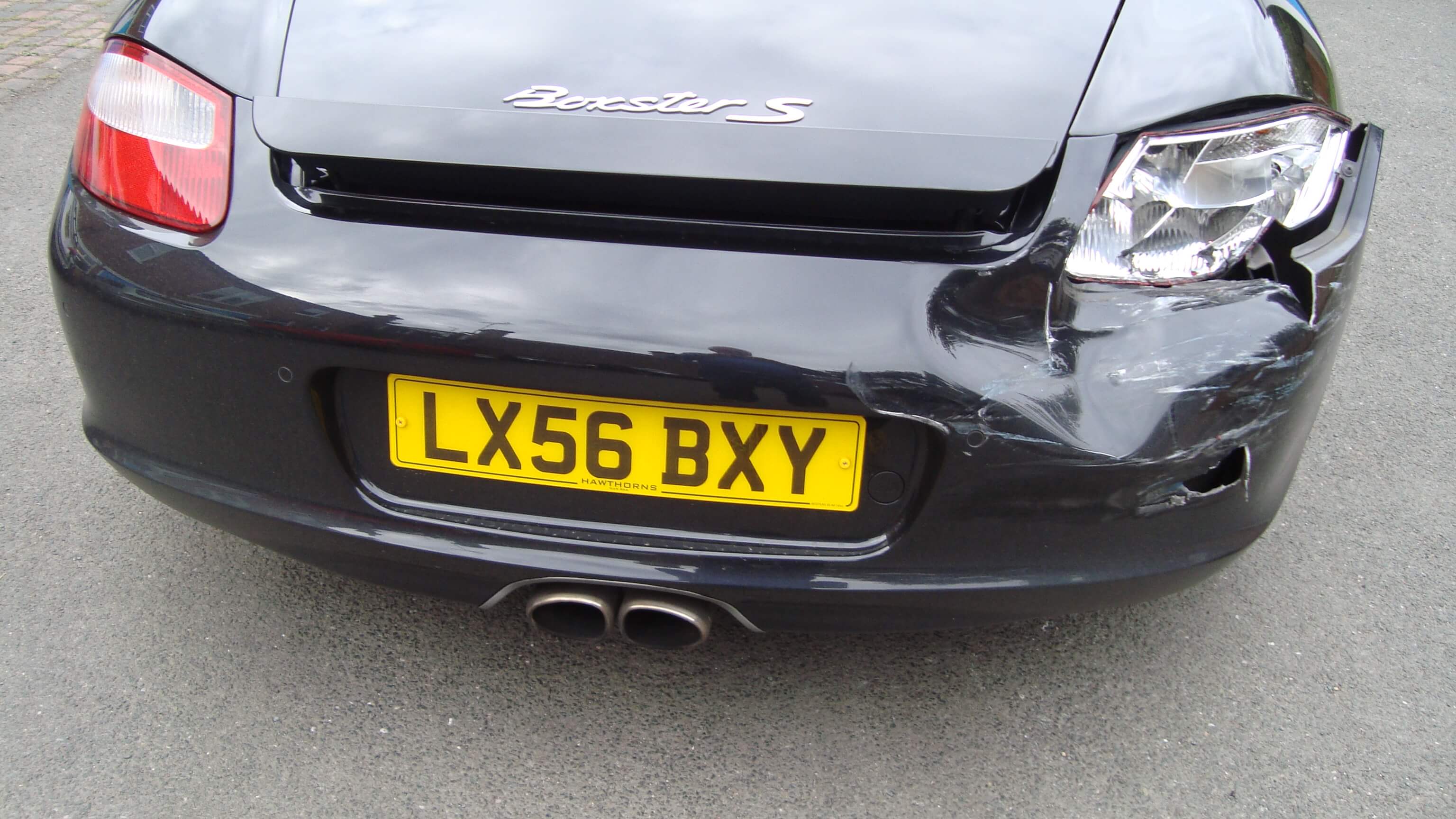 porsche boxster with damaged rear