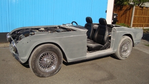 in the process of fixing a dent