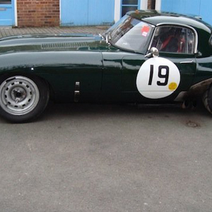 green car with 19 on the side